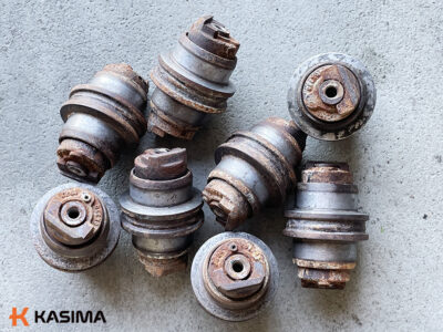 CAT 303E bottom rollers